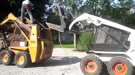 skid steer tip over|skid steer flipping over.